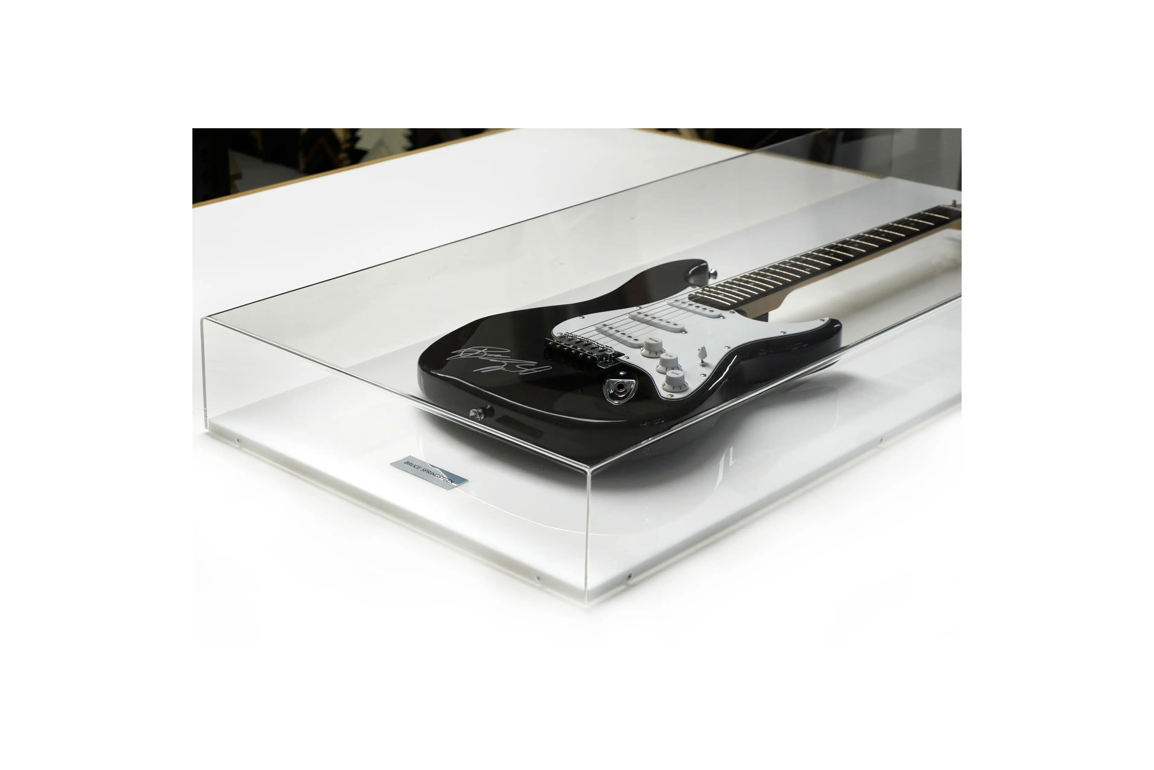 Bruce Springsteen signed electric guitar displayed in a bespoke clear acrylic display case, handcrafted for premium presentation and long-term preservation.
