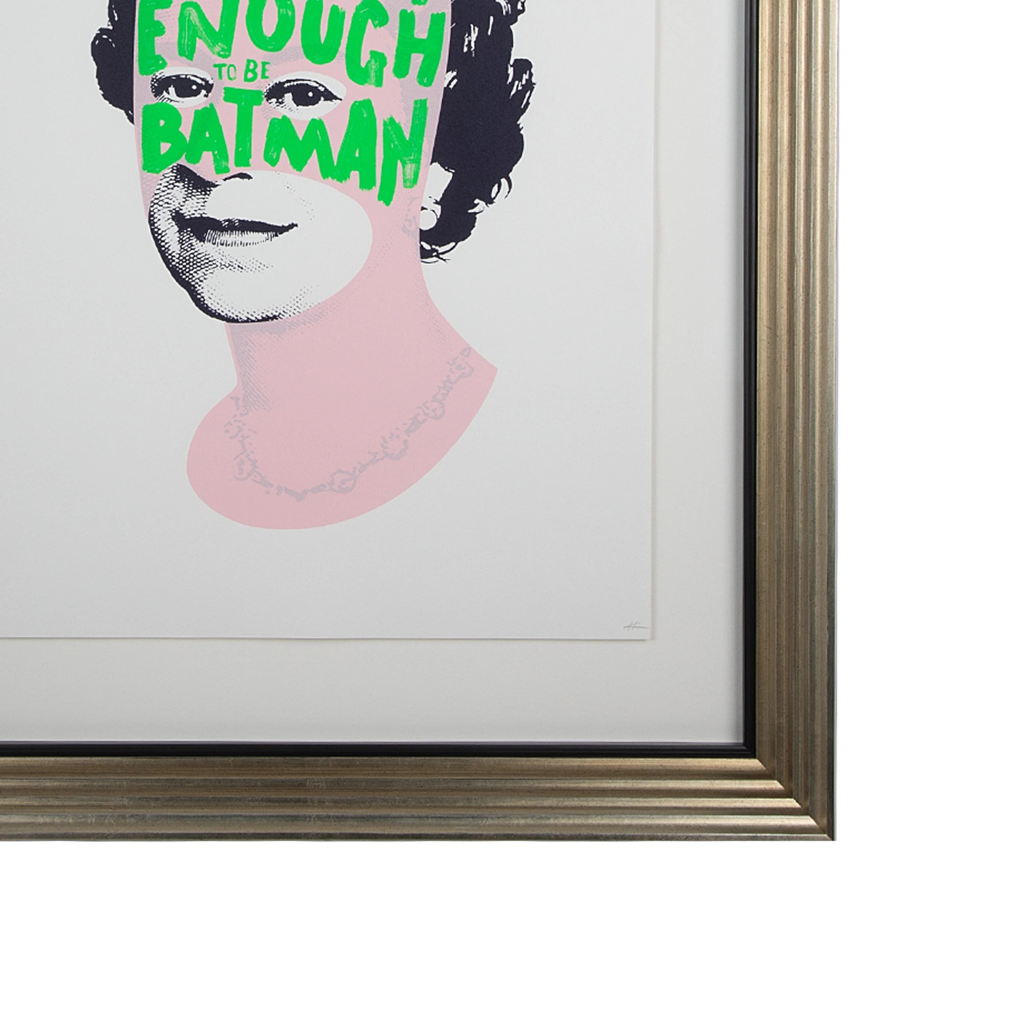 Rich Enough to Be Batman – Black & Green Queen, corner detail showing the Accordion silver frame with black fillet, white mat board and contemporary portrait artwork featuring a queen with green "Enough to Be Batman" lettering across a pink face.